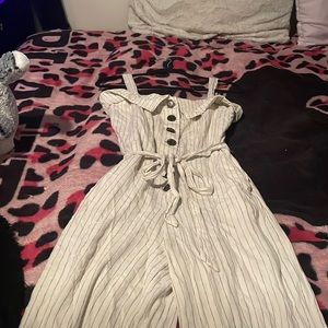 White with black striped jumper/pantsuit, size small. Only worn a few times.